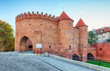 Barbican fortress in the historic center of Warsaw. Poland. clipart