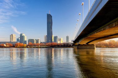 View modern city with Danube river in Vienna, Austria clipart
