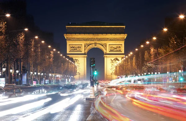Triumfbågen paris stad vid solnedgången — Stockfoto
