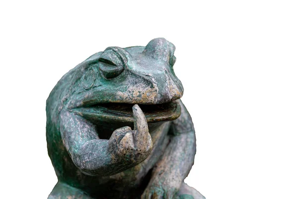 An isolated image sculpture of a green frog showing middle finger