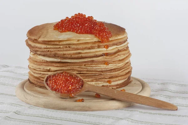 Caviar of red fish on pancakes — Stock Photo, Image