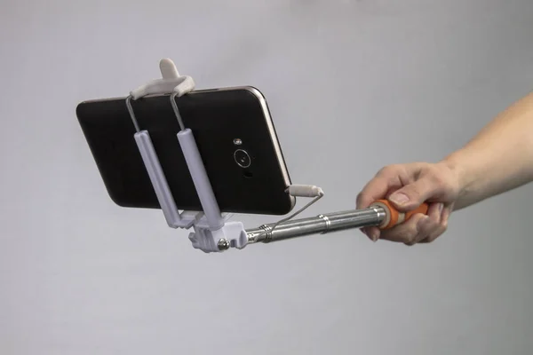 Selfie Monopod Met Een Zwarte Mobiele Telefoon Hand Van Het — Stockfoto
