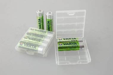 several batteries in a special box clipart