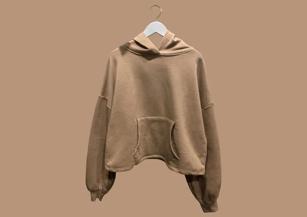 Bruin Basic Capuchon Sweatshirt Hanger Geïsoleerd Bruine Achtergrond Samenstelling Van — Stockfoto