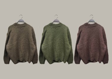 Kahverengi arka planda izole edilmiş askılarda bir sürü büyük örgü süveter var. Kıyafet kompozisyonu. Banner konsepti. Moda kıyafet kolajı. Moda konsepti. Desen