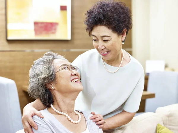 Caring senior asian women showing friendship — Stock Photo, Image