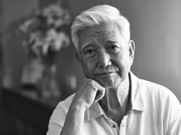 Black and white portrait sad asian senior man — Stock Photo, Image