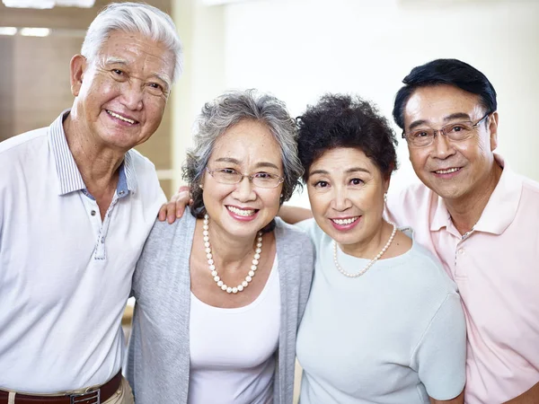 Two senior asian couples getting together — Stock Photo, Image