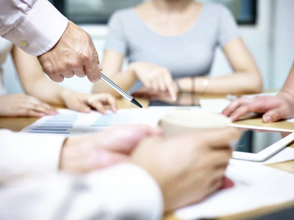 group of asian business people meeting in office