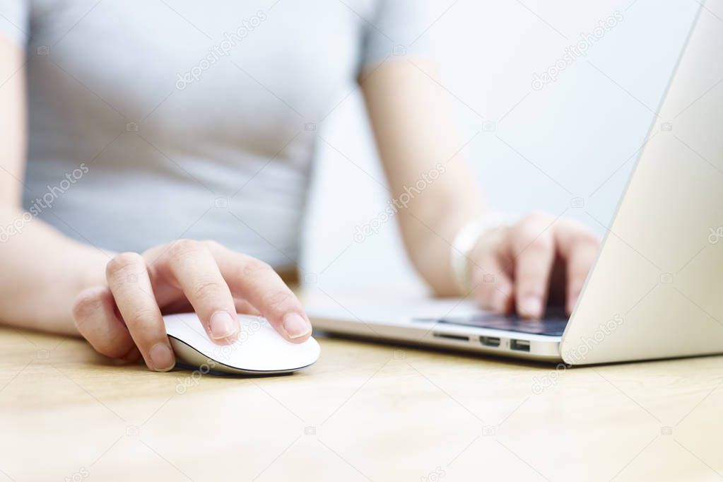 woman working with laptop computer