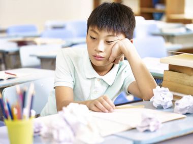 frustrated asian school boy clipart