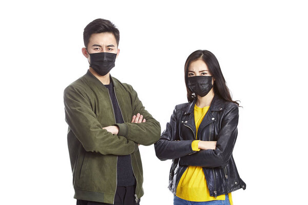asian couple wearing black mask
