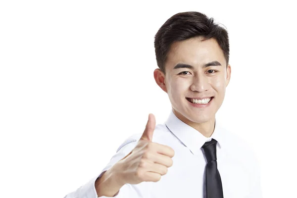 Молодой азиатский бизнесмен показывает большой палец вверх знак — стоковое фото