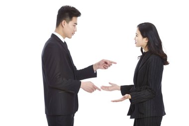 asian businessman and businesswoman having an argument clipart