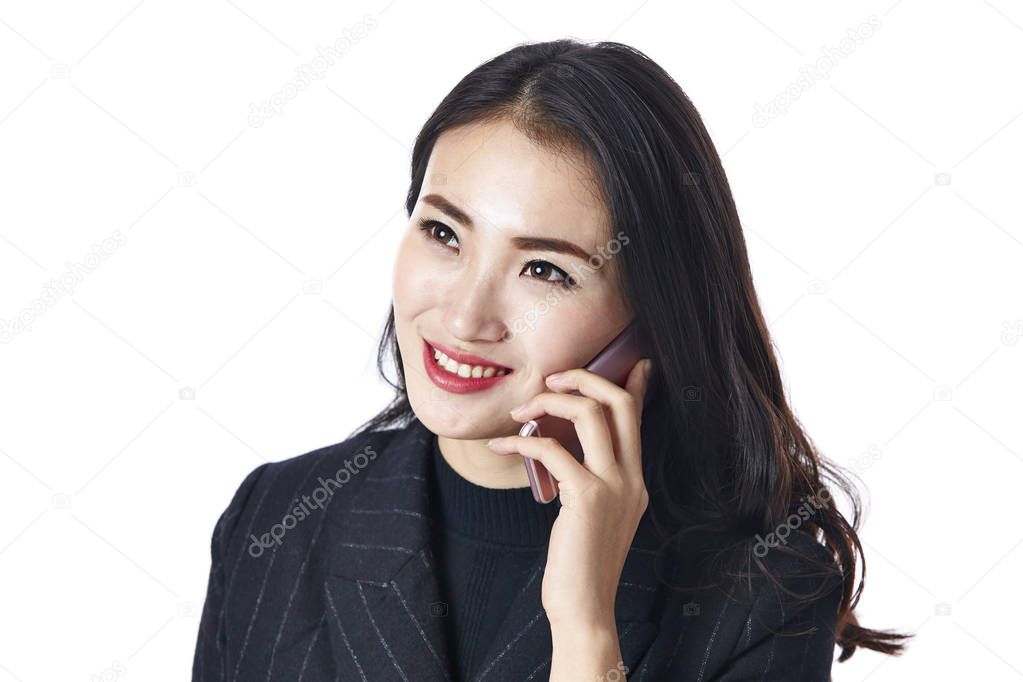 asian businesswoman talking on cellphone