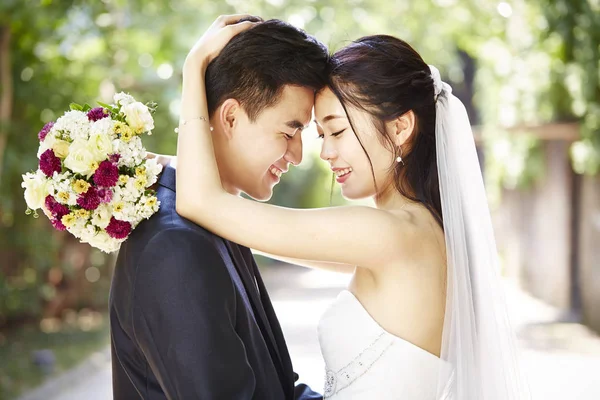 Loving asian newly-wed Stock Image