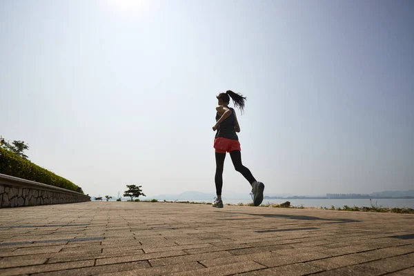 Young Asian Adult Woman Running Jogging Outdoors — Stockfoto