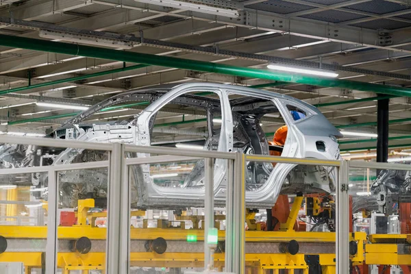 Robots making car body at modern car factory