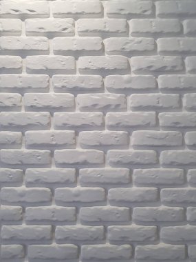 Beyaz alçı tuğla duvar.