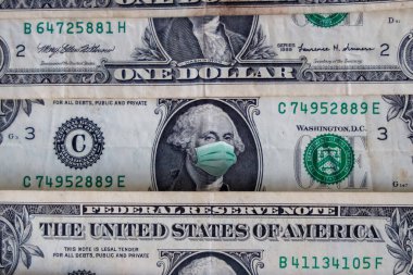ABD 'de COVID-19 Coronavirus, yüz maskeli bir dolar. Coronavirus küresel borsayı etkiler. Dünya ekonomisi Corona virüsü salgını ve salgın korkularıyla sarsıldı. Kriz ve finans kavramı.