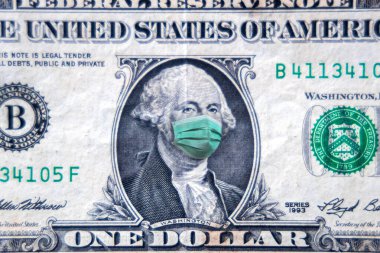 ABD 'de COVID-19 Coronavirus, yüz maskeli bir dolar. Coronavirus küresel borsayı etkiler. Dünya ekonomisi Corona virüsü salgını ve salgın korkularıyla sarsıldı. Kriz ve finans kavramı.