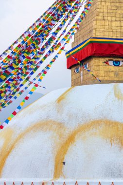 Katmandu, Nepal 'deki Boudhanath veya Bodnath Stupa. Stupa, Nepal 'deki Lumbini' den sonra Budist dindarlar için en kutsal yerlerden biridir..