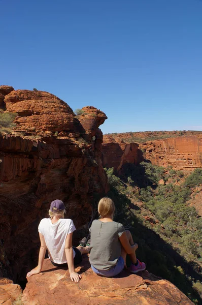 KINGS CANYON, AUSTRALIA May 5, 2015: young womens enyoing view of the Kings Canyon, Watarrka National Park, Northern Territory, Australia