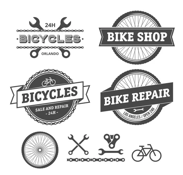 Tienda de bicicletas y emblemas de reparación — Vector de stock