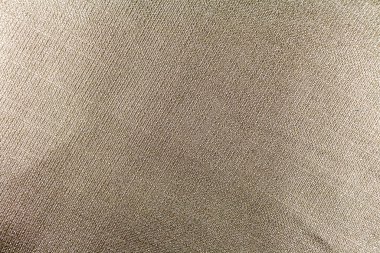 Gri kumaş dokusu ve birbirine bağlı iplikler. Arkaplan.