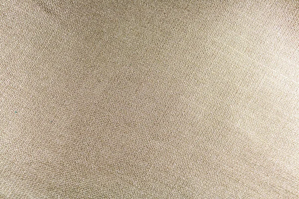 Textura šedé tkaniny s propletenými nitěmi. Pozadí. — Stock fotografie
