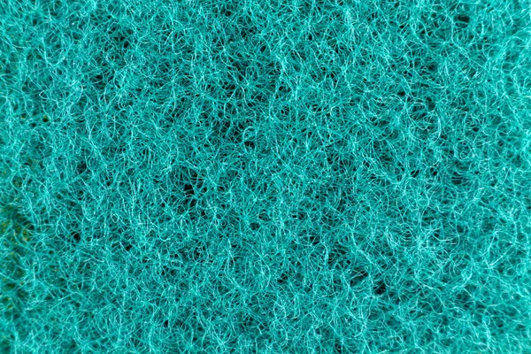 Kék szivacs rostos anyagból. Textúra, háttér. Növekedésben — Stock Fotó