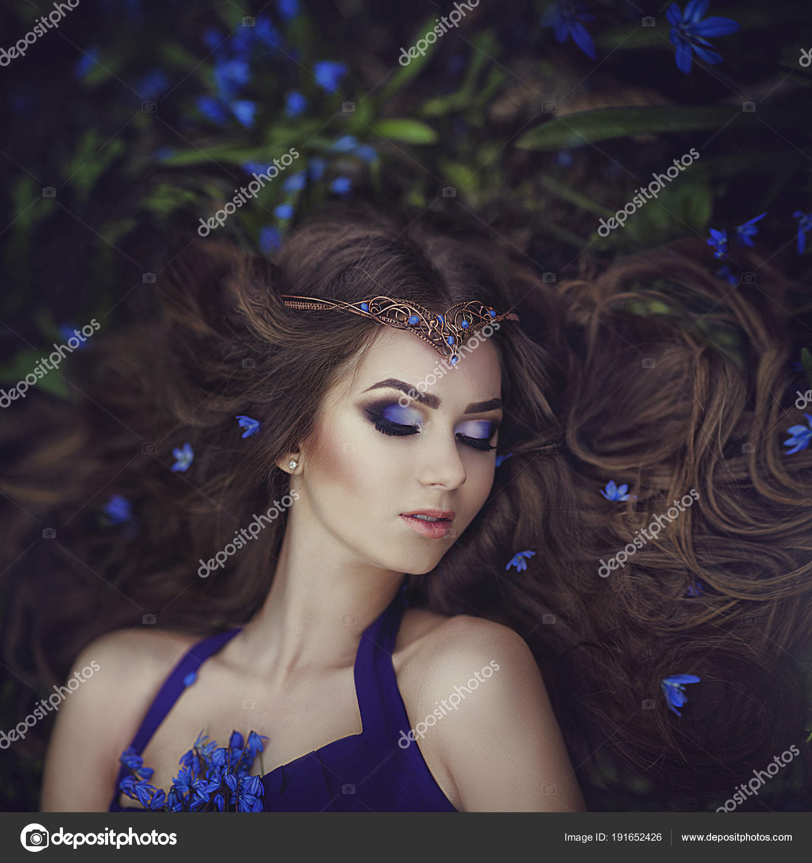 Elf Girl With Long Hair In The Tiara Rests In Spring Forest