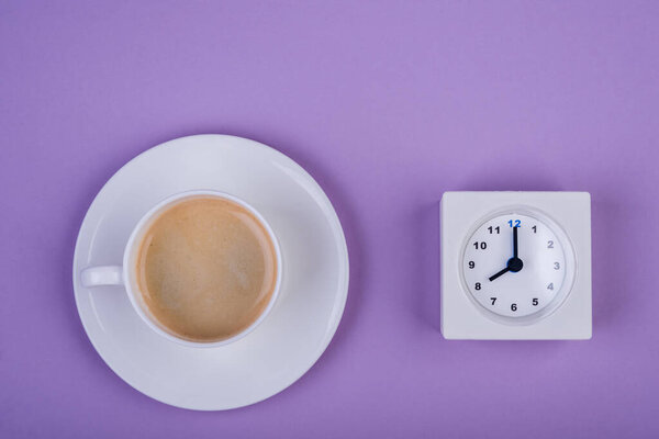 Morning coffee, coffee cup time clock concept, top view