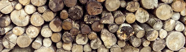 Pilha empilhado natural velho serrado madeira logs fundo, vista superior — Fotografia de Stock