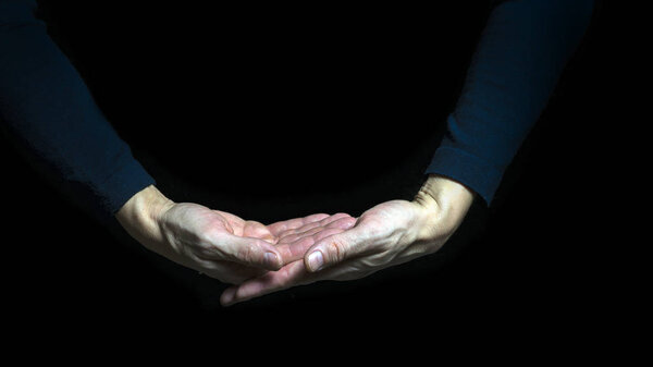 Praying hands concentrating attentively and meditation on beliefs or hope background. Gestures of hands and mourning with soul.