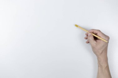 Kalem silici ile Fotoğraf Eli beyaz arkaplanda gölgeli bir şey