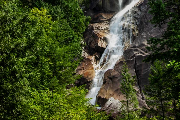 Rushing through the rocks to the ground - Shannon Falls, BC, Canada Stock Photo