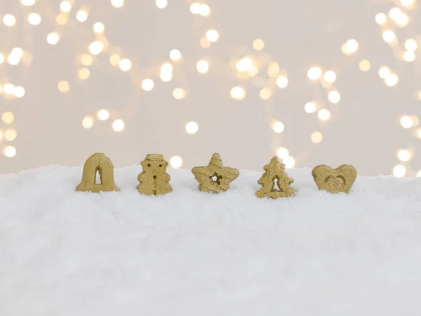 Biscoitos Dourados Natal Neve Branca Com Luzes Brilhantes Fundo — Fotografia de Stock