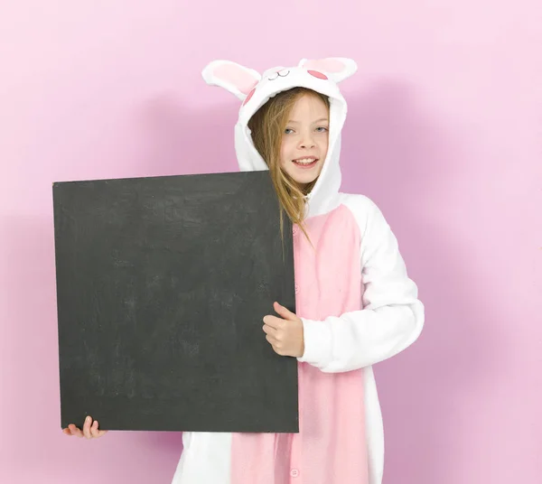 Happy Pretty Blonde Girl Cozy Rabbit Costume Empty Blackboard Posing — 스톡 사진