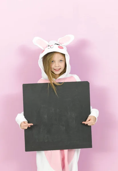 Happy Pretty Blonde Girl Cozy Rabbit Costume Empty Blackboard Posing — 스톡 사진