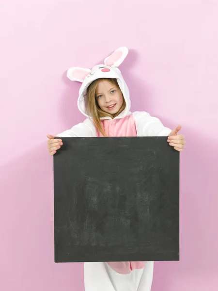 Happy Pretty Blonde Girl Cozy Rabbit Costume Empty Blackboard Posing — 스톡 사진