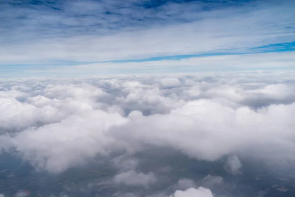 Big Blue sky and Cloud Top view from airplane window,Nature back