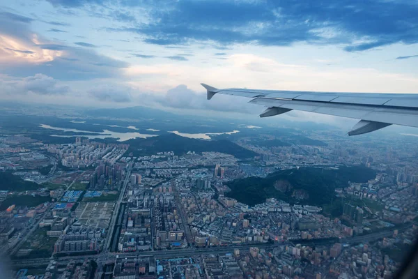 Clouds and sky as seen through window of an aircraft — Stock Photo, Image