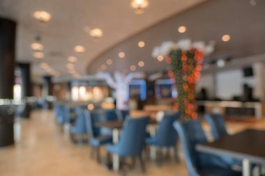 Restoran iç için arka plan bulanıklık. Kahve dükkanı veya kafe restoran ile soyut bokeh ışık görüntü arka plan bulanıklık