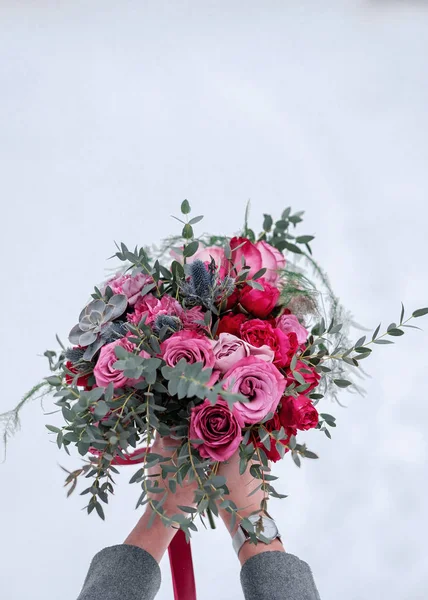 Beautiful bouquet with roses and eucalyptus