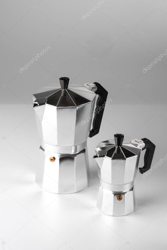 Geyser coffee makers on the light background