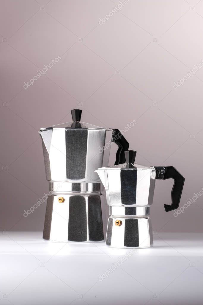Geyser coffee makers on the light background
