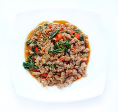 Domuz biber ve fesleğen yaprakları ile.