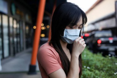 Beautiful asia  Woman suffer from sick and wearing face mask  pr