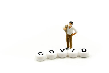 Miniature people : coronavirus covid 19 infected patient caution outbreak alert.